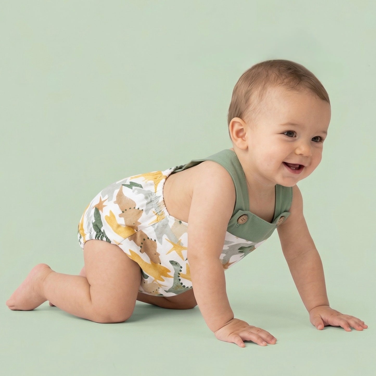 Luciano green dinosaur print romper